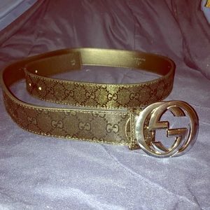 Black Gucci belt with silver Gucci  buckle